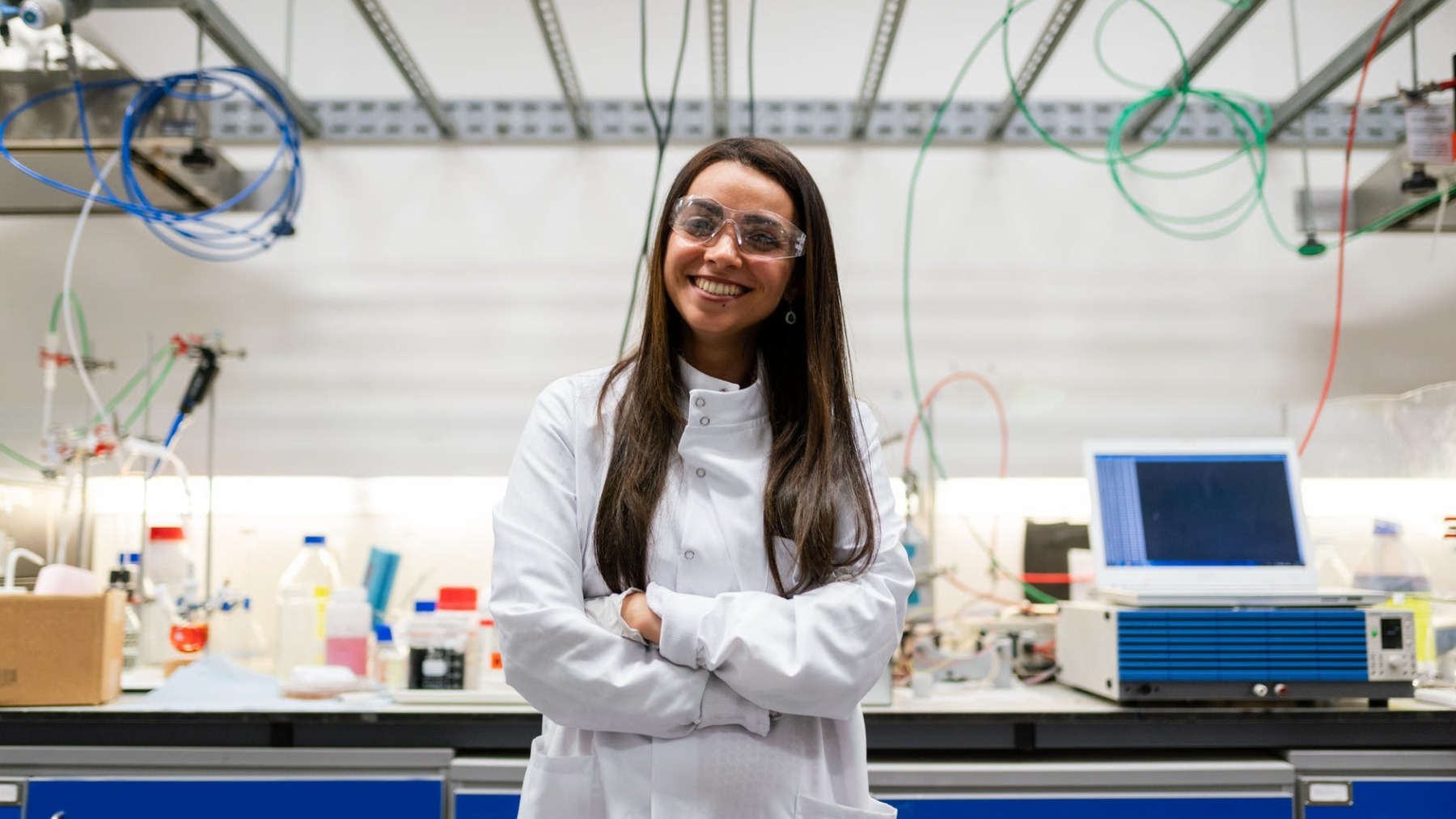 photo of female engineer wearing lab coat